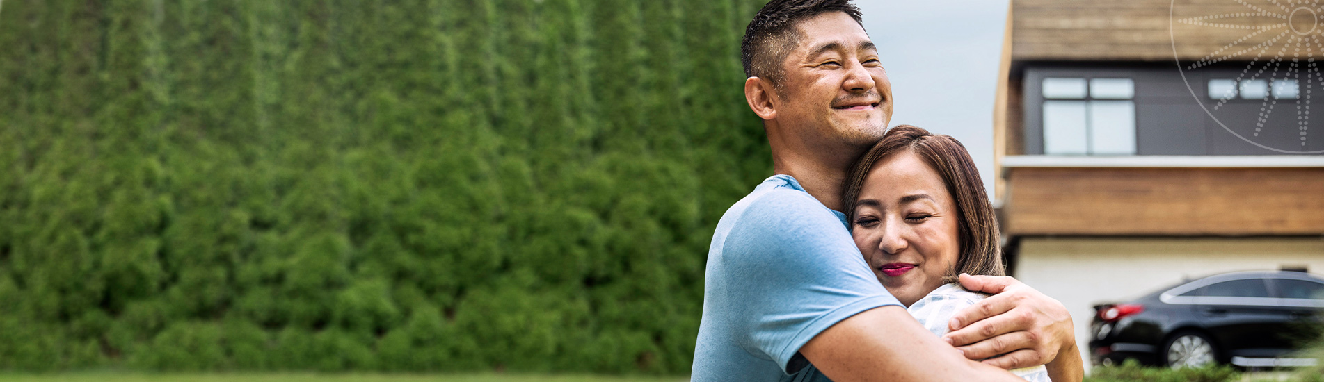 middle-aged asian couple hugging